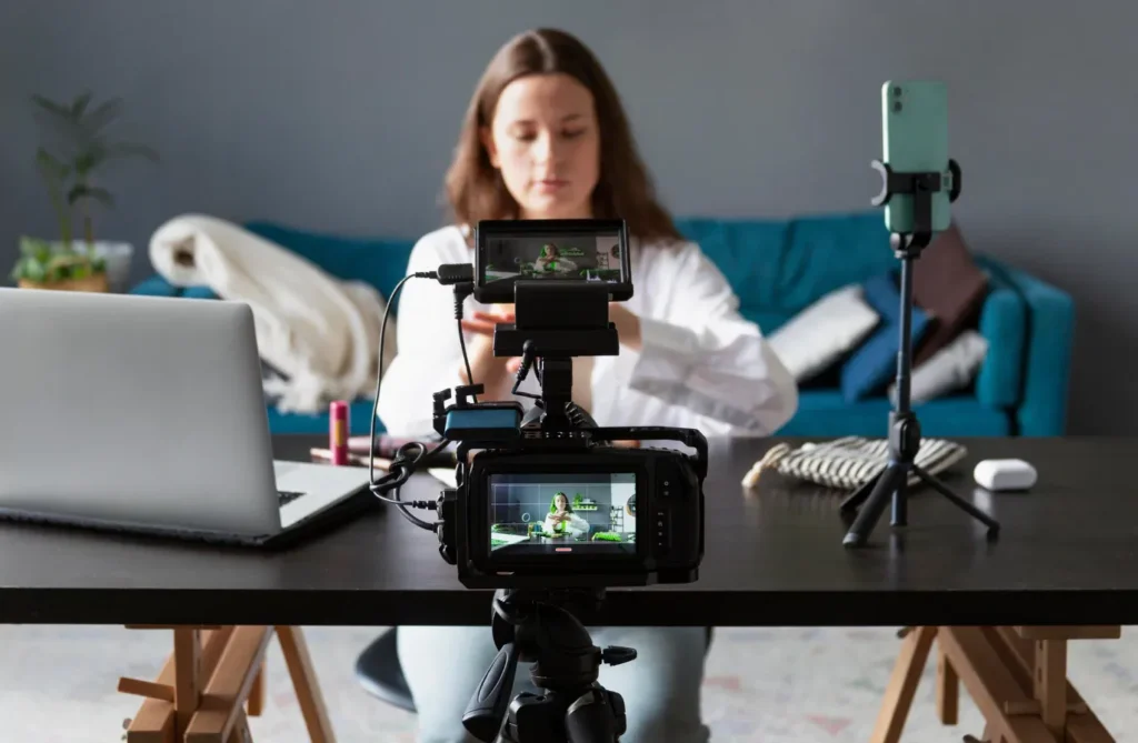 Women sitting in front of a camera for a marketing video recording